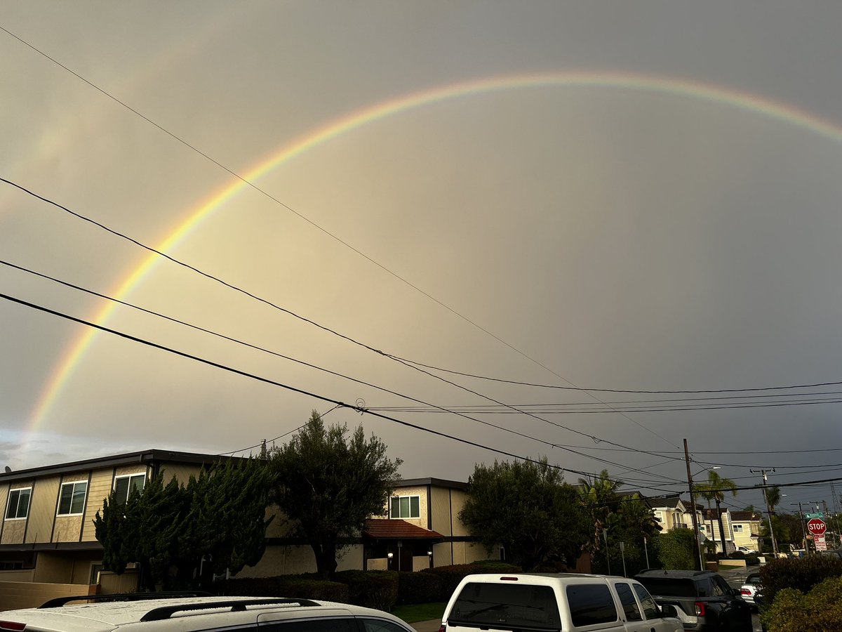 pawboye's tweet photo. rainbow and a nice sunset https://t.co/704ytD2UqG