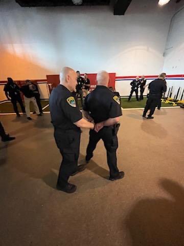 BCPS_POLICE's tweet photo. Spotted our BCPS Police brushing up on their de-escalation and handcuffing skills! 👮‍♂️Who knew keeping the peace could have a fun side? Kudos to our officers, detectives, command staff and even @JaimeAlberti99 for leveling up their game! 🌟 #CommunitySafety #TrainingAdventures https://t.co/6GzDBij1VE