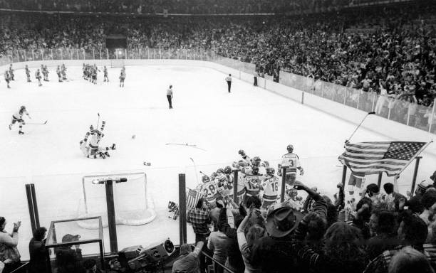 hockey_samurai's tweet photo. The shot from behind the net as Team USA celebrates their Miracle on Ice victory over Soviet Union at the 1980 Lake Placid Winter Games. https://t.co/CRDK5rzZ42