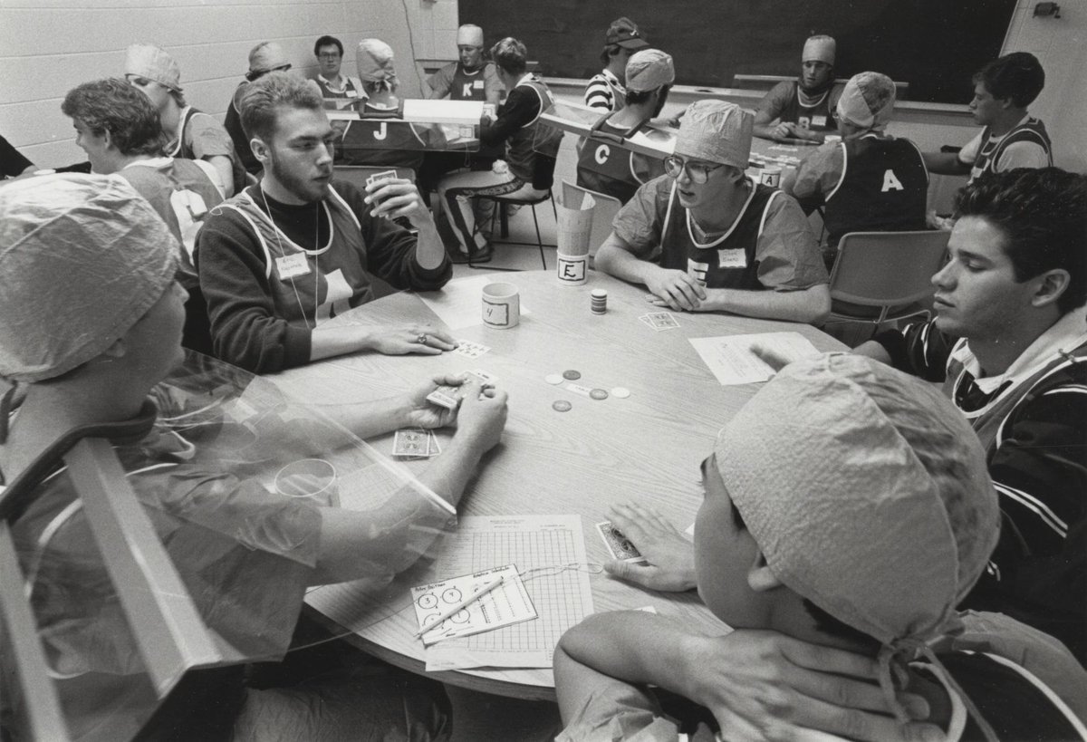 Photo from the classic 'all night poker game' studies of the transmission of the common cold academic.oup.com/jid/article-ab…