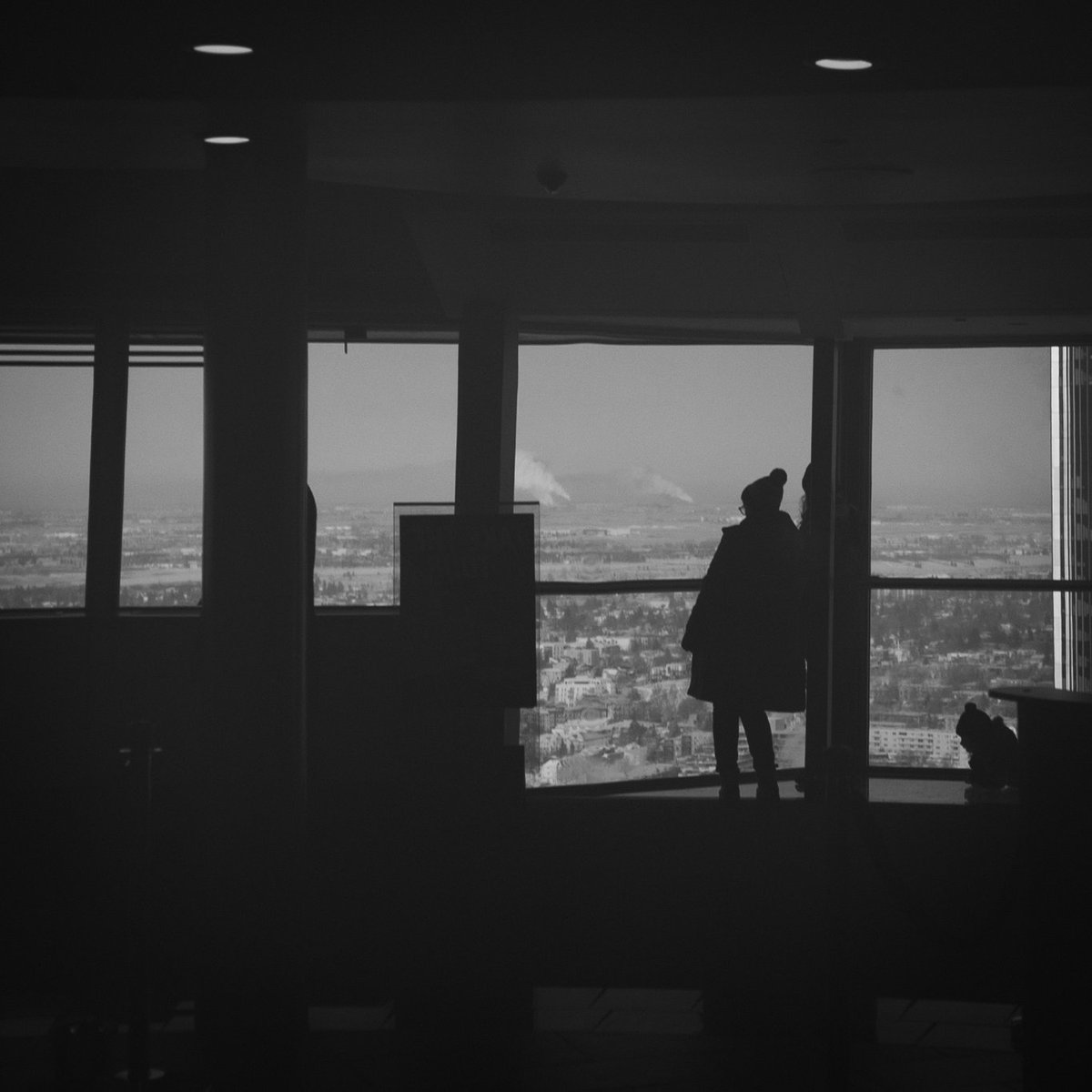 Haven't been spending much time at all on this platform.

Life + business stuff going on in the backdrop.

So here's a photo I took in Calgary Tower.

Loving the b&amp;w aesthetic atm.