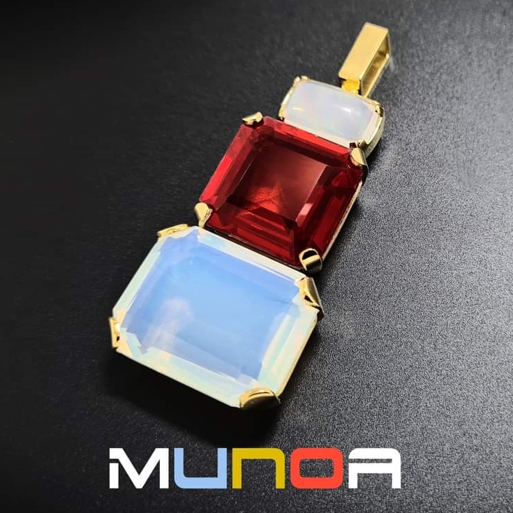 joyeriaMunoa's tweet photo. Extraordinaria pieza de joyerรญa creada en nuestro taller artesano de Aldamar 28 para la clienta โMCโ a juego con un anillo que le hicimos anteriormente Es un gran colgante con tres grandes #opalos, dos blancos y uno de fuego, montados en oro amarillo 18k. #Donostia #SanSebastian https://t.co/cyEvTWWhTx
