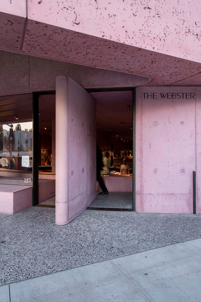 4 years of The Webster. The Webster's 8 foot wide, cast-in-place, center-pivot, concrete door weighs approximately 3.2 tons. Despite its significant weight, its motor and sensors have been calibrated to gently and softly rotate the door open and close at the push of a button.