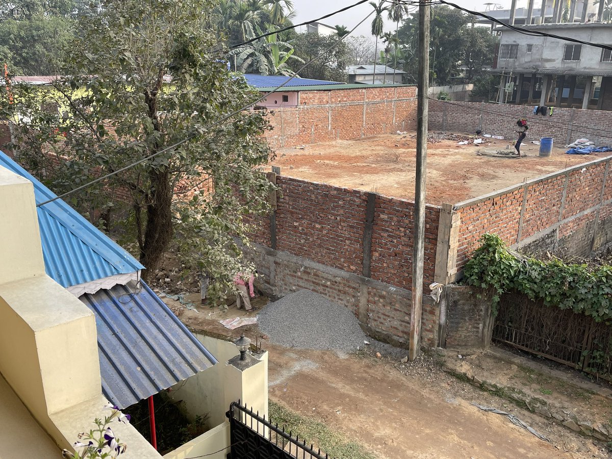 arup647's tweet photo. @gmc_guwahati ….is this allowed …see the road level &amp; boundary wall height https://t.co/pCVrkh7vpa