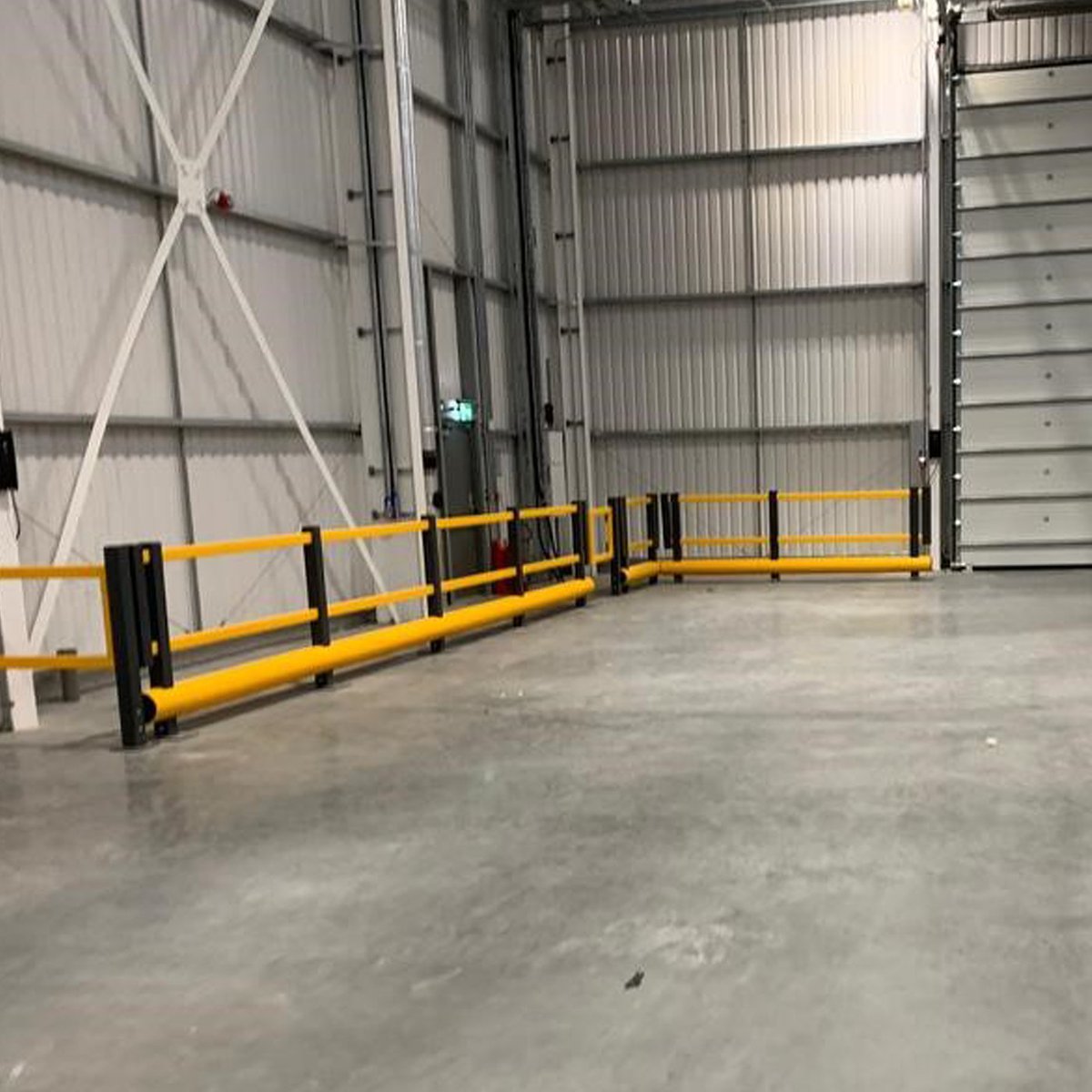 Another great installation, protecting port warehousing logistics and workers. 

These high Density Polyethylene (HDPE) plastic barriers flex on impact to absorb energy  - to minimize floor damage, vehicle repair and driver injury.