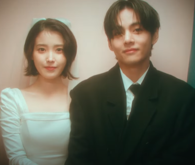 AboutMusicYT's tweet photo. IU and Taehyung in the music video for 'Love Wins All'. https://t.co/513EFGhfFT