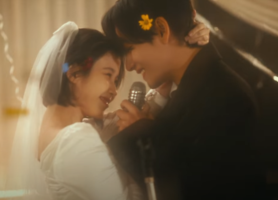 AboutMusicYT's tweet photo. IU and Taehyung in the music video for 'Love Wins All'. https://t.co/513EFGhfFT