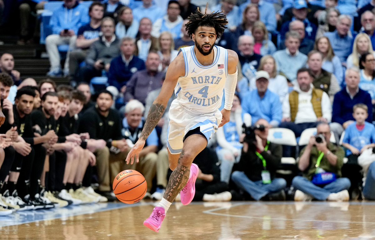 JacobTurnerNC's tweet photo. Is RJ Davis the best player in CBB? 🏀 

• 21.0 ppg (1st in ACC, 14th nationally)
• 20+ pts in 12 of #UNC’s 19 games
• 24.5 ppg average vs. ranked teams 

So, is he? 🤔 https://t.co/NWHPwJiGJy
