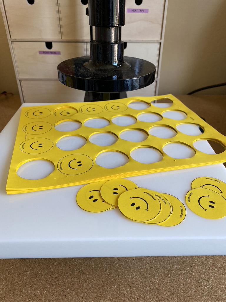 rebelbuttons's tweet image. behind the scenes! my die-cutting press is such a time saver.  I used to have to cut each circle individually.  now I line them up and cut 10+ pages at a time!
😃😄😆
#rebelbuttons #custombuttons #buttonmaking #handmade #etsy #shopify #creativeprocess #sneakpeek #production #bts