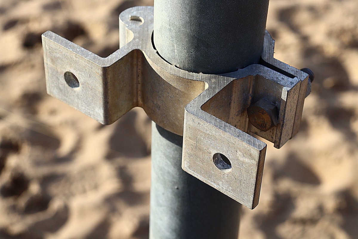 A metal pole with a metal object around it.

#metal #metalphotography #photography #photo #photos #photograph #photographs #object #objects #objectphotography #objectphotos #metallic #metalobjects