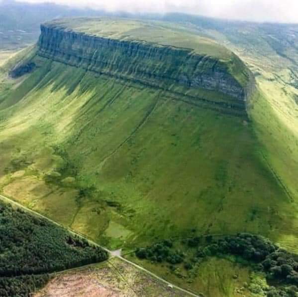 Feast your eyes upon Ben Bulben, Ireland's table-top-like mountain, as the crows see it. Part of the Dartry Mountains, you'll find Ben Bulben in County Sligo, in an area known as 'Yeats Country'! 📷 @nednaic - @instaireland  
@LoveIreland3 @VisitSligo