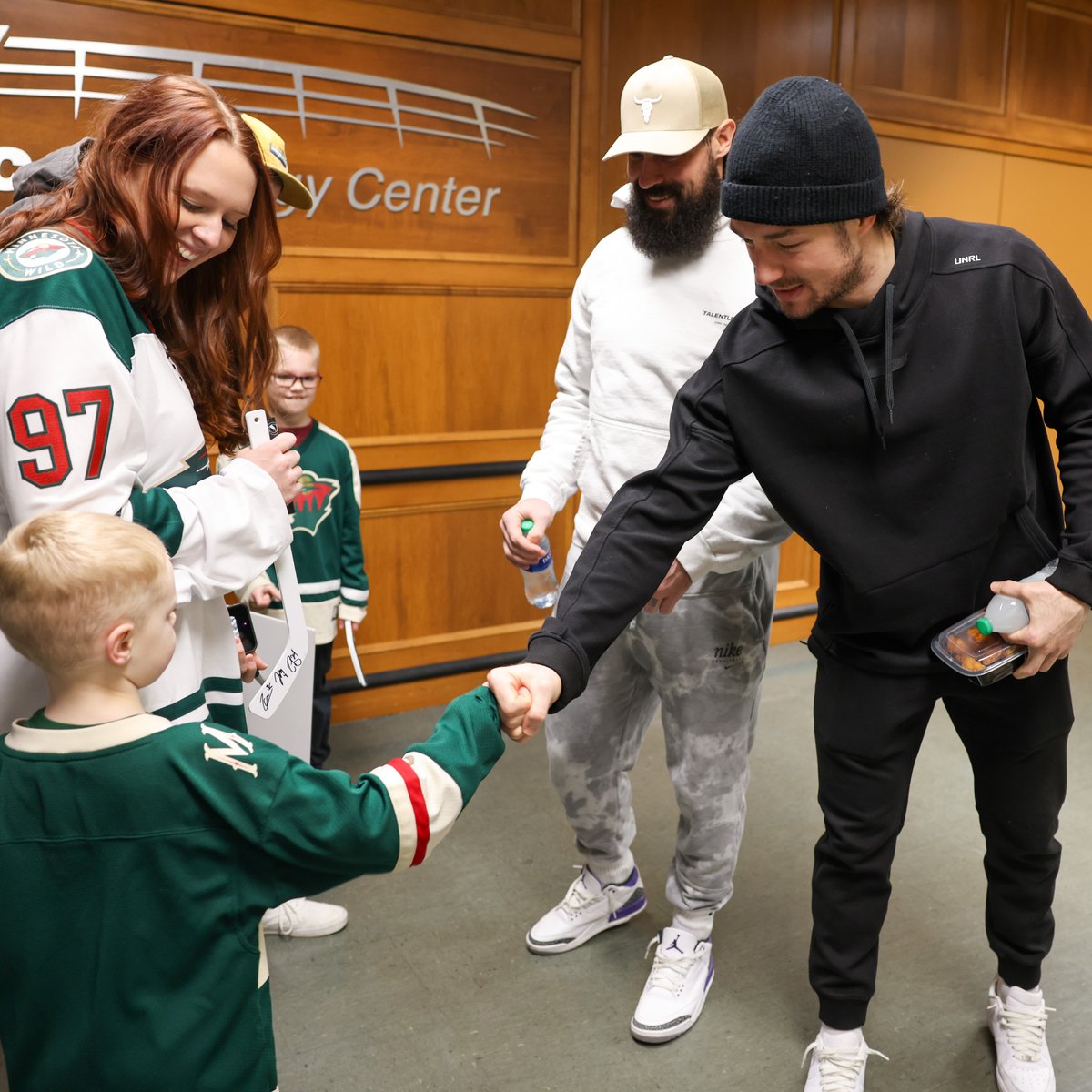 Making new friends 🥹 Thanks for joining us as Wild for a Day, Sayer! 🏒 #mnwild