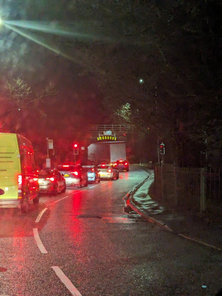 capt_carl's tweet photo. @PKendrickWIG could you let people know to avoid Gathurst bridge, lorry driver thinks he's driving a convertible got stuck. https://t.co/LigeE4aflz