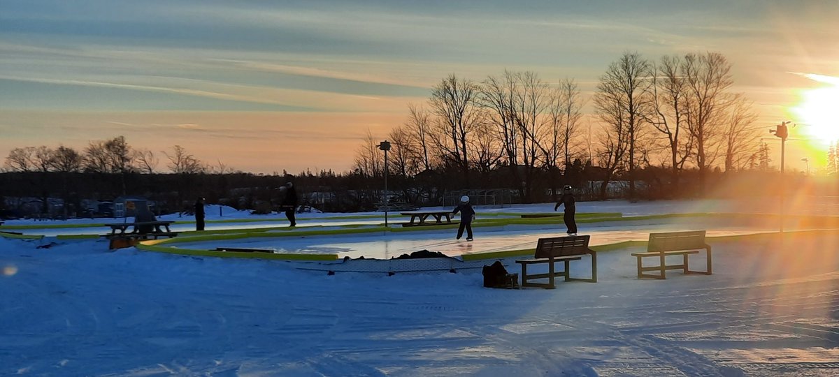 Beautiful scenery , rink and youth having a perfect evening . Thanks to Town Staff for this beautiful rink at Terry Fox Centre .