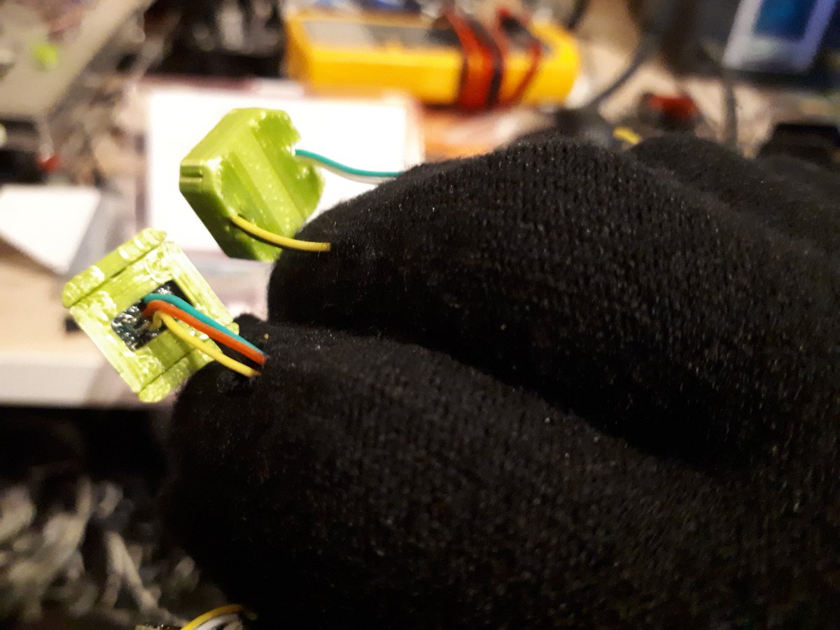 ImmersiveDevice's tweet image. Some changes to decrease the size of some pieces and making assembly easier.

No more individual threading of wires. The whole bundle including the JST connector goes through the fabric (small cut is necessary of course). Much easier and much happier :)