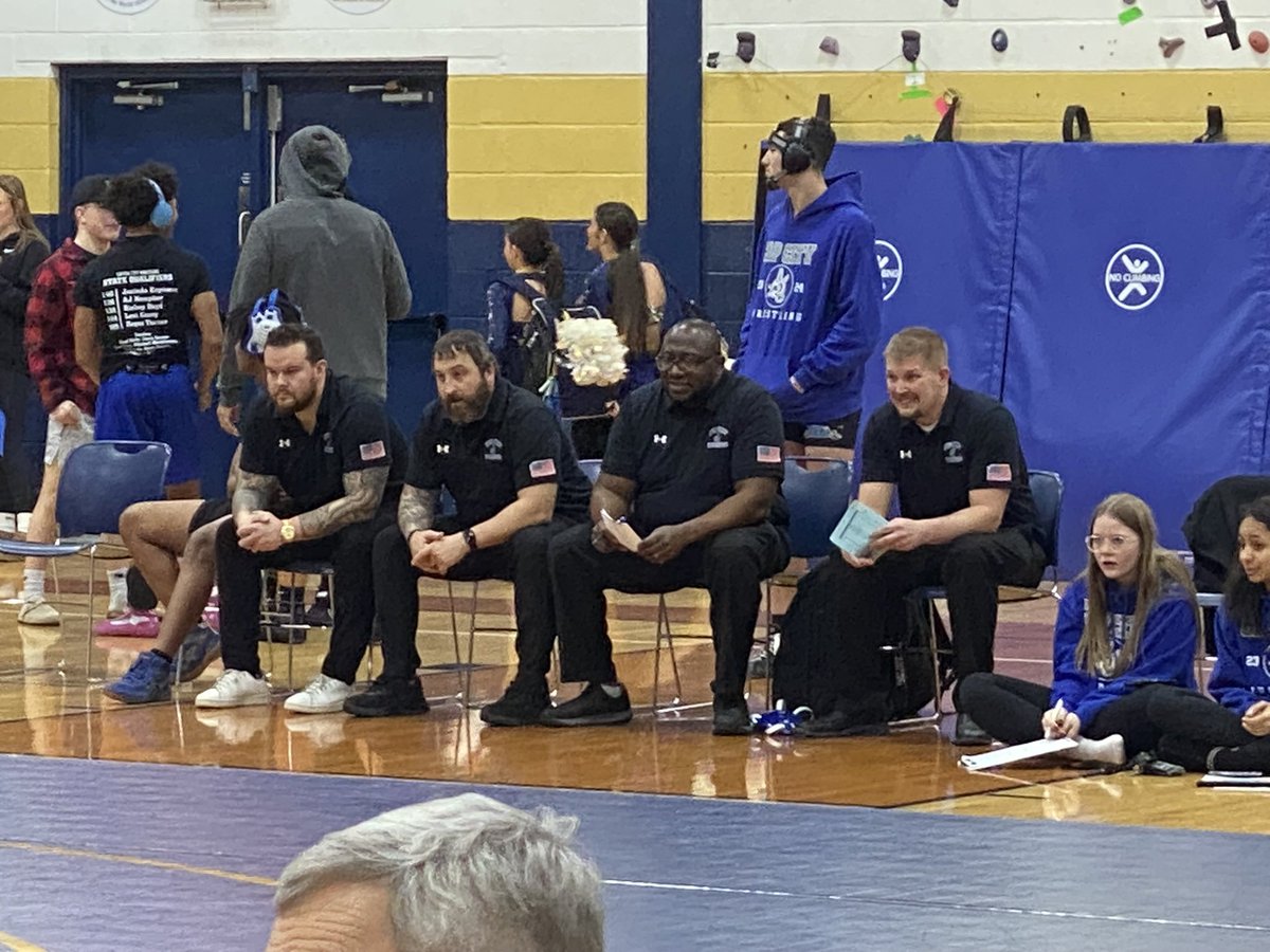 Our CCHS Wrestling coaching staff looks TOUGH in the all black with the flags on the sleeves! Love it! Great game day ‘fit!! 💪🖤⚔️💙