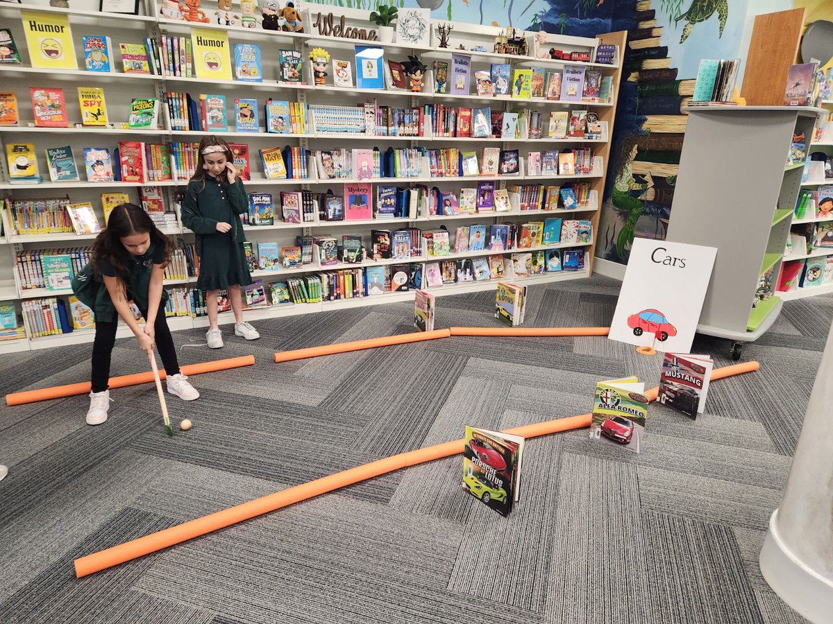 We've turned our library into a literacy minigolf course and the kids are loving it! @trishg1 @LisaOckerman @librarylife