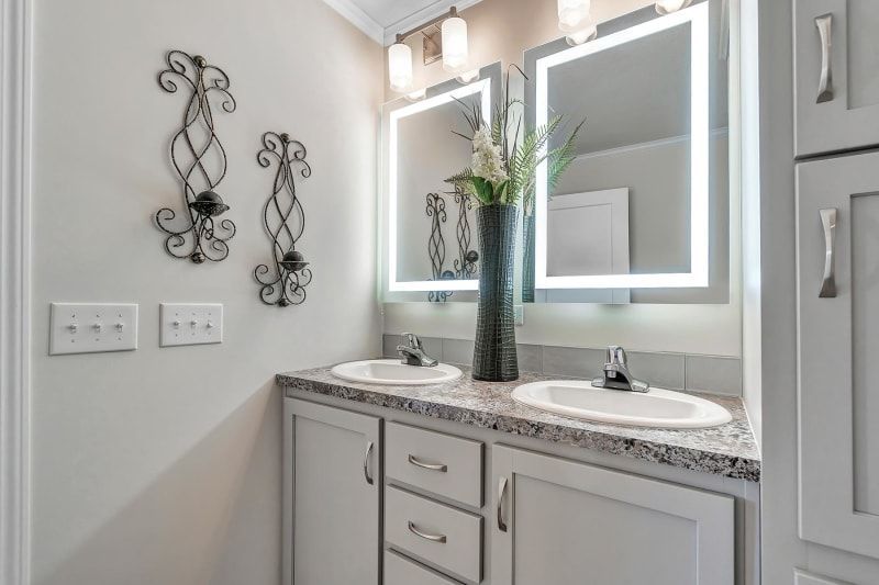 YourINDHomes's tweet photo. His and her sinks rest on granite countertops, enhanced by vanity light mirrors for a touch of glamour. The shower, featuring a marble tiled design, exudes sophistication, while the free-standing tub offers a luxurious escape. 

Visit https://t.co/6f0Nom9i54 for more https://t.co/knrFQ8mrzA