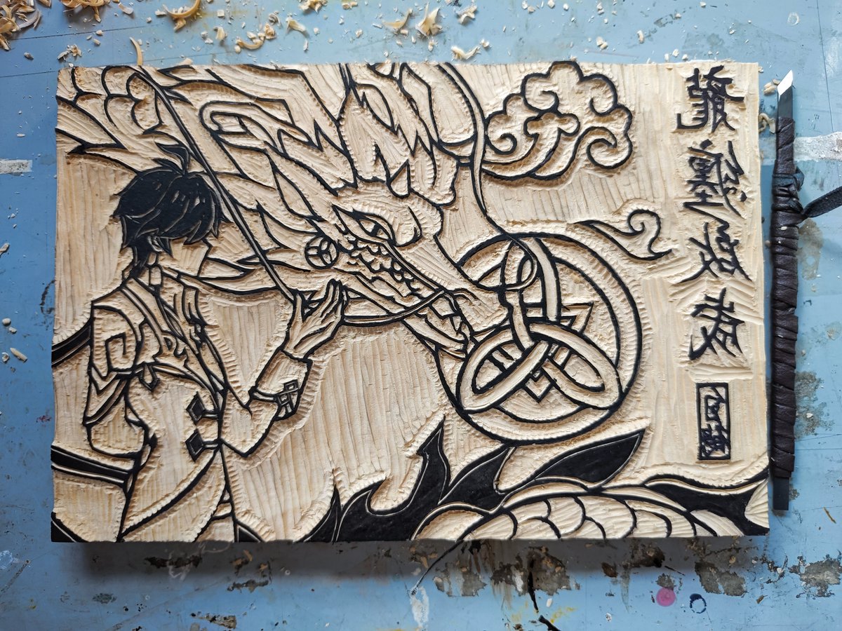 EVILrose325's tweet photo. 龙年，所以刻了钟离的木板年画 https://t.co/BY3bnDDUtw