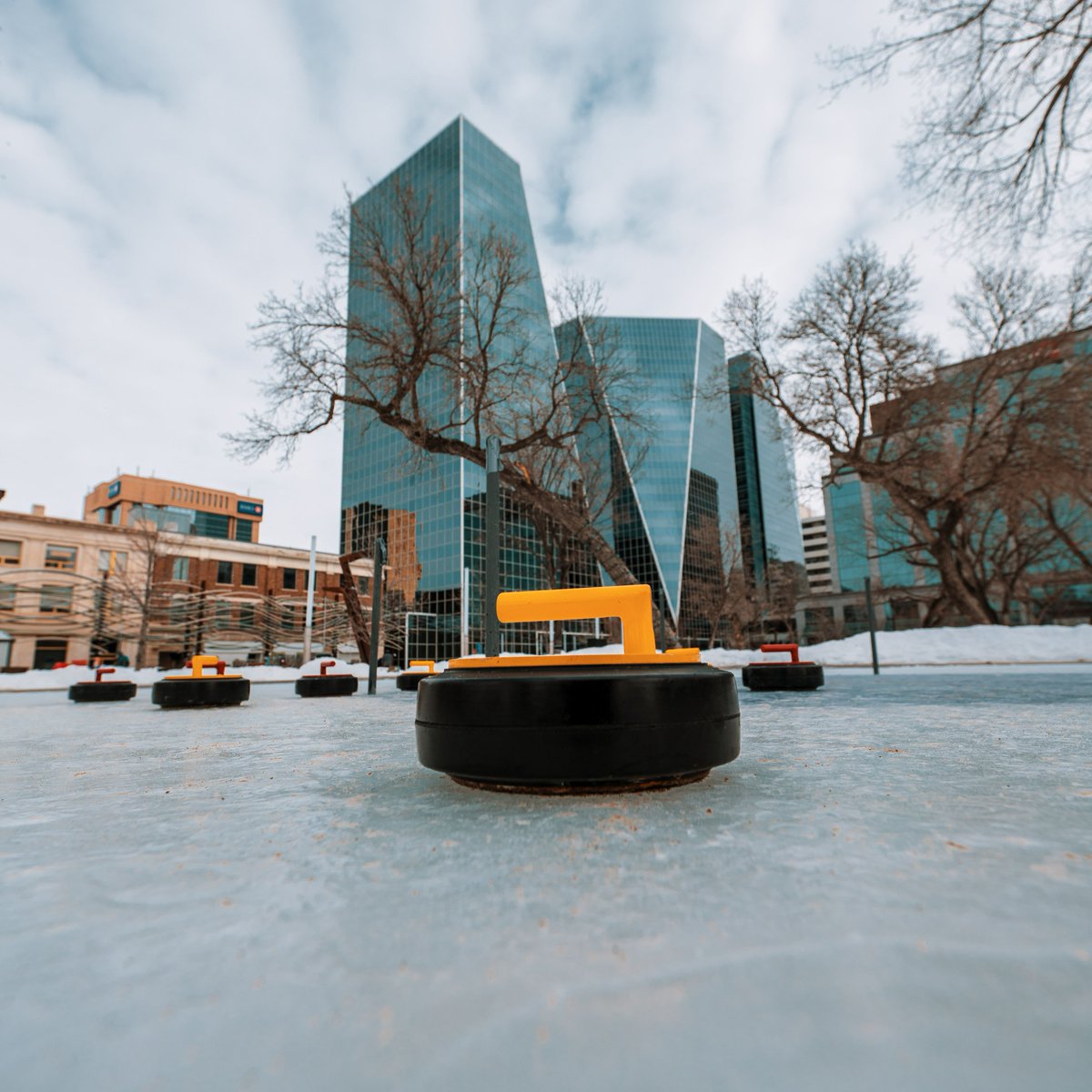 CityofRegina's tweet photo. What do you get when you mix the board game Crokinole with the sport of Curling? Crokicurl! 🥌  It's simple, fun, and FREE!

Crokicurl is available during supervised hours at 5 locations in the City! Visit https://t.co/v6Mye0uJy6 
#WinterCityYQR #ExploreWinter https://t.co/sZRky4S7Lg