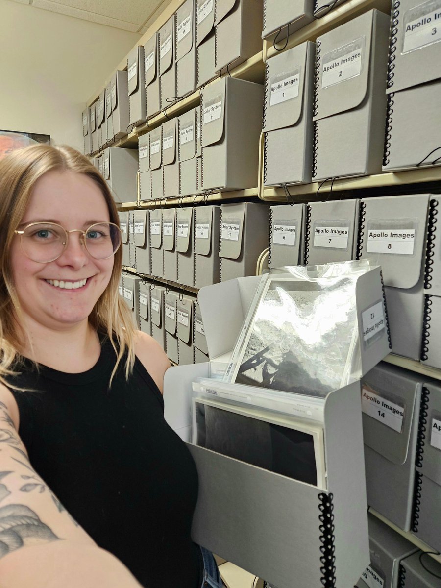 USGS_AstroGeo's tweet photo. Happy Library #Shelfie Day! Our AstroLink is a diverse #library of historic maps, rock samples, spacecraft images, and documents from decades of space exploration! Holly and Sonya just had to share their #selfies with some of our favorite stores! #Selfie #LibraryShelfieDay #RPIF https://t.co/C7W0Idvy9R