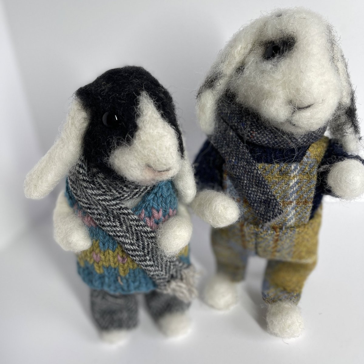 These 2 needle felted bunnies look like they are away to cause mischief of some sort!