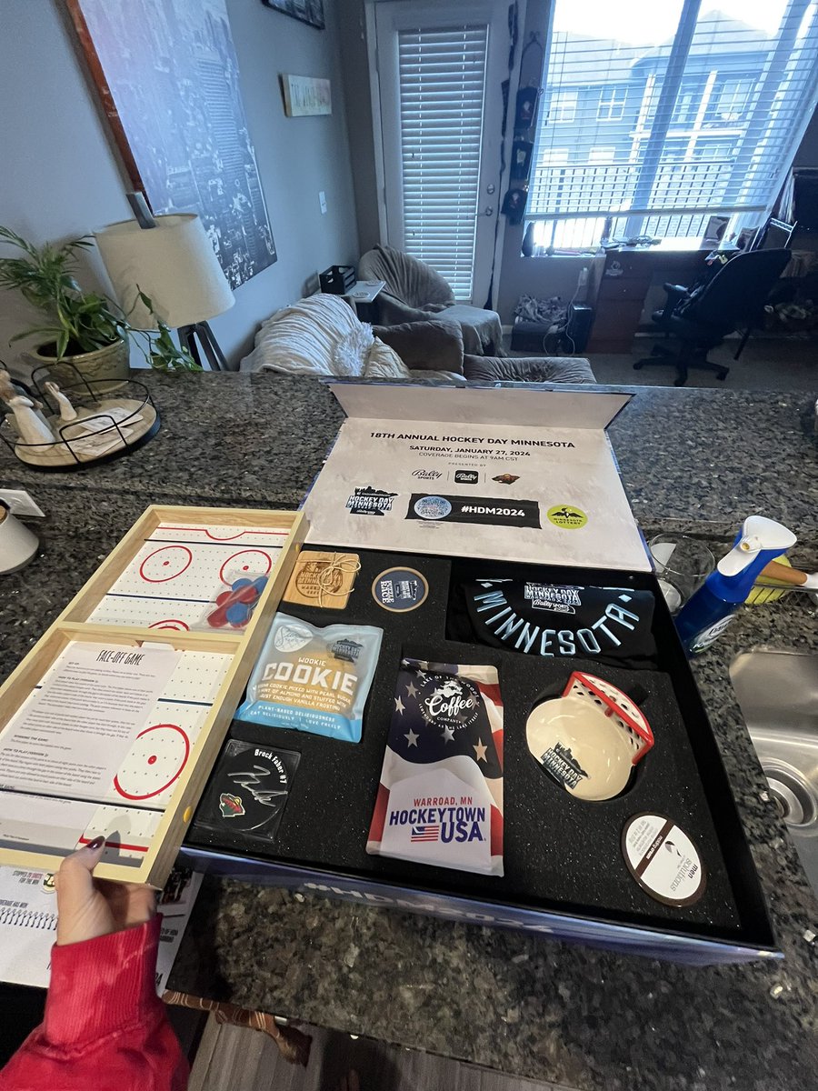 marissavoss's tweet photo. What’s in the @HockeyDayMN PR boxes for this year!

👚: @unrlco 
☕️: Lake of the Woods Coffee Company.
🥣: @MAXISCreations 
💈: @GreatClips 
🍪: @sweettroovi 
🧩: Big Stick Studio
🏒: Professor Puzzle 
🥅: Brock Faber signed puck. 
📺: @BallySportsNOR subscription 

#HDM2024 https://t.co/OYW1qXWCQD