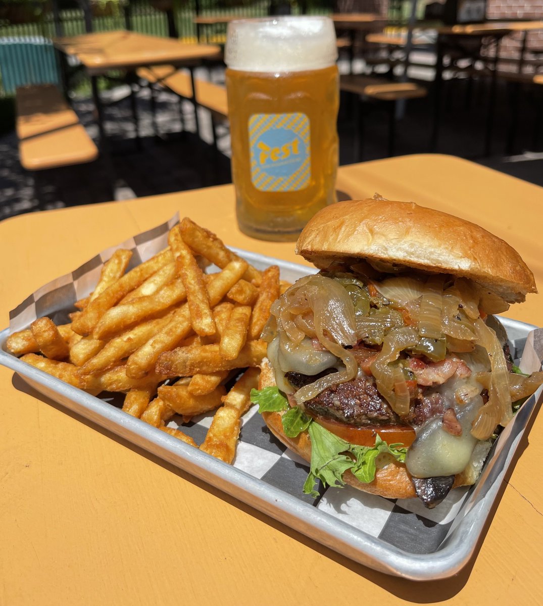 festva's tweet photo. A juicy, loaded burger and a cold beer are partners in crime of pleasure here at Fest. Knock your taste buds out of this world with burgers like our Philly Burger! It is covered with Muenster cheese and loaded with crispy bacon and sautéed onions, mushrooms and peppers!

#festva https://t.co/3MOIFoIH8O