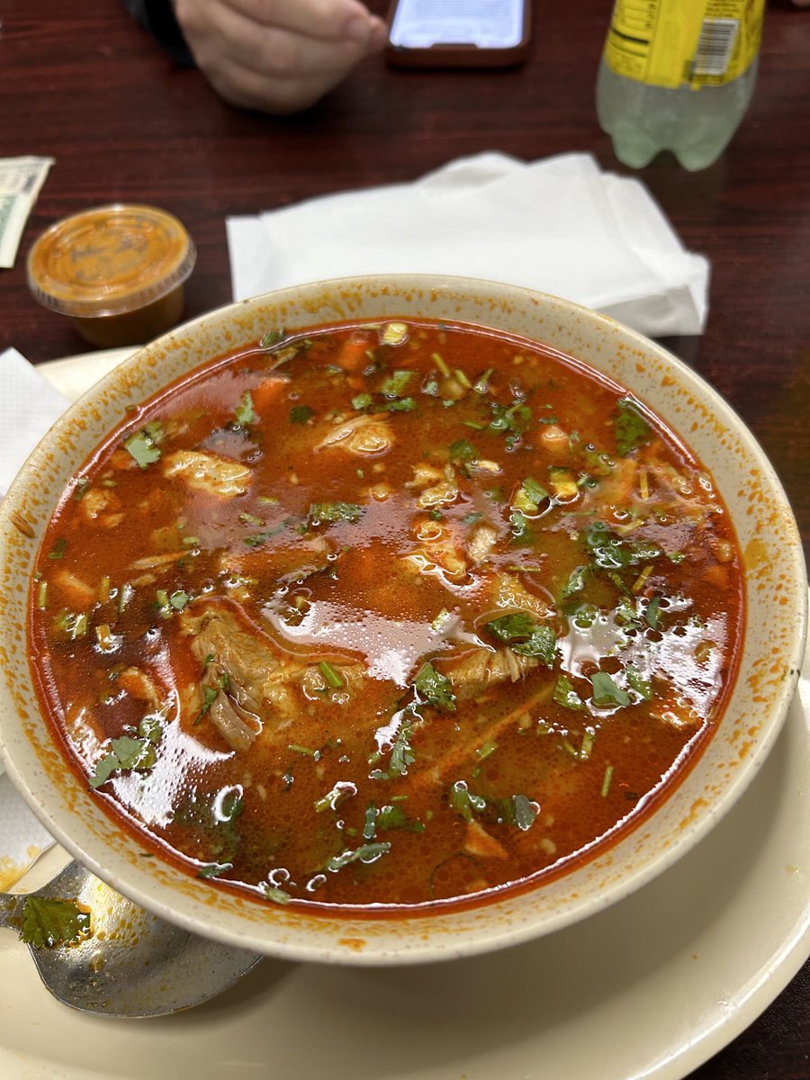 RevMelanieNOLA's tweet photo. Eric and I eating at Guanajuato, a superb hole in the wall Mexican place in Durham NC, and this is their posole soup. #Mmmmmmmmm https://t.co/3ws2K2wJc8
