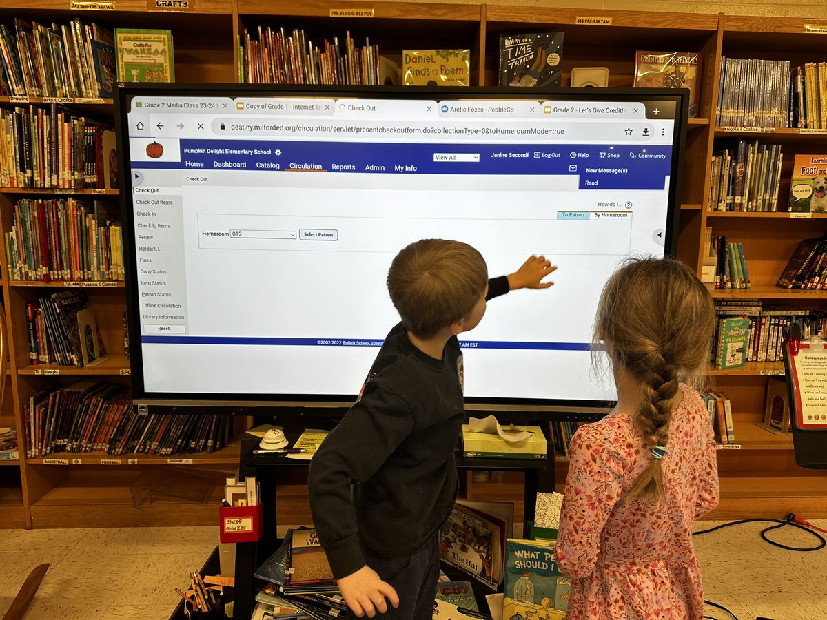 MrsSecondi's tweet photo. #KnowledgeMobility at its finest! Students conduct self checkout and those with experience with Destiny teach other students who want to conduct circulation for the class.
Grade 2 https://t.co/A3yvraXfh6