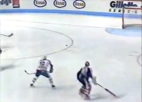 NEFHLOilers's tweet photo. @MarcPDumont Here's a good shot of Eddie the Eagle trying to cut down the angle... I remember him roaming freely from board to board behind the net, too, chasing pucks. https://t.co/m067Wkw2Ju