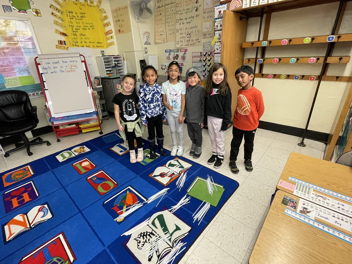 First grade mathematicians counted how many straws their group received by making groups of ten <a href="/SparkeShines/">J.F. Sparke School</a> 🐾