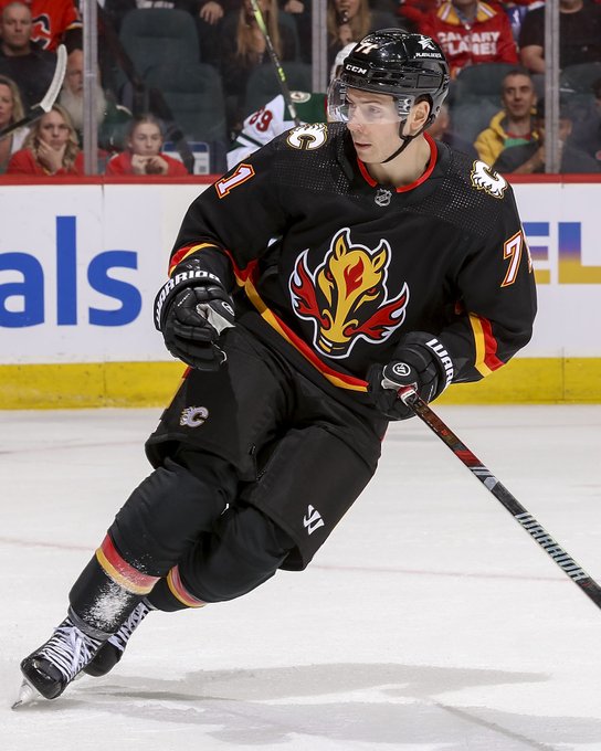 Walker Duehr skating against the Minnesota Wild
