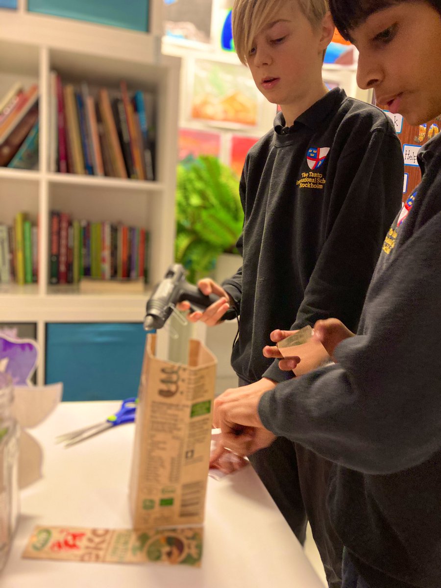 Making a periscope in their Science lesson.