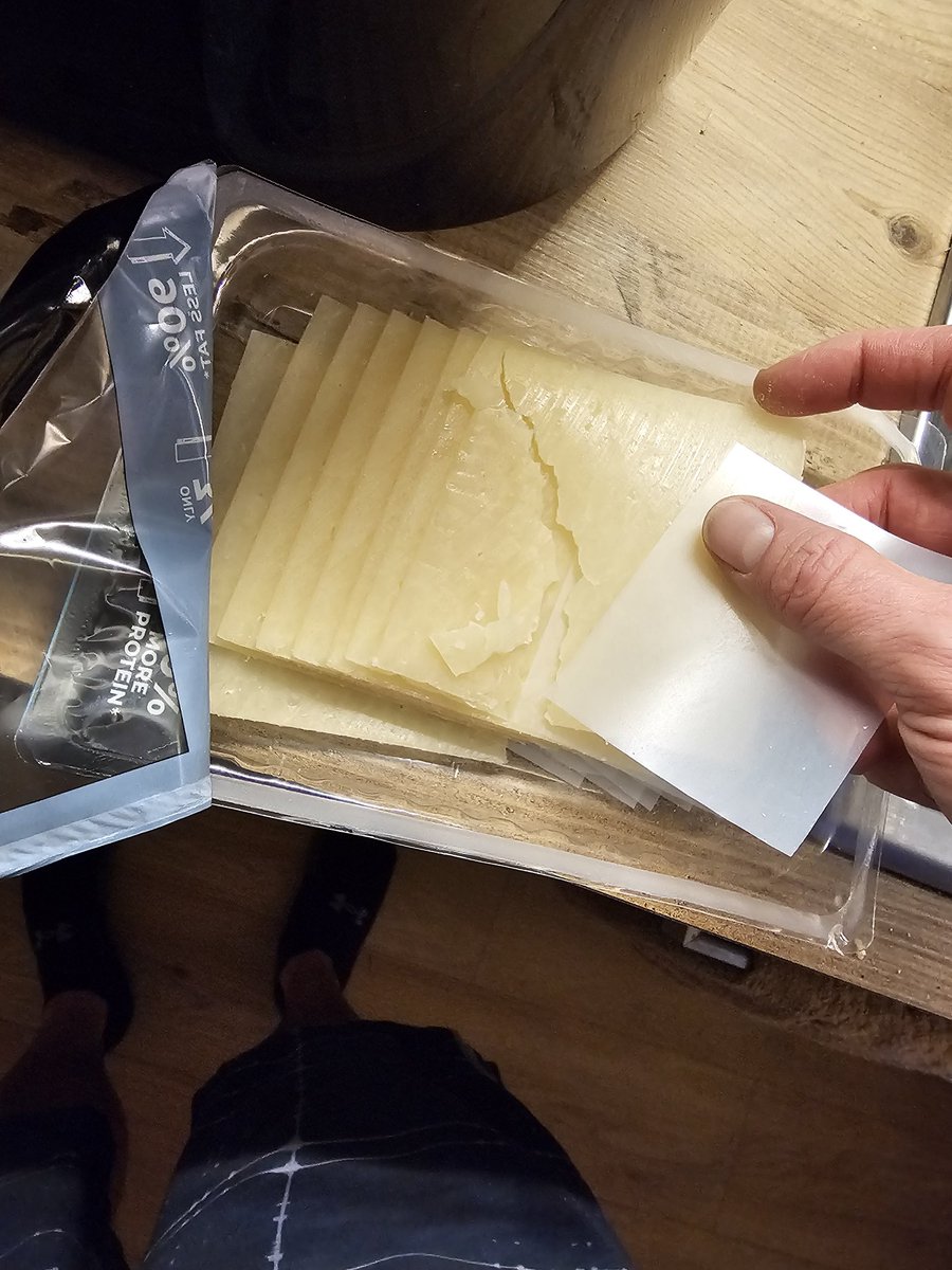 JDWAndrews's tweet photo. Hey @eatleancheese, I love your cheese, but have to say the quality control on your slices is getting worse, the divider sheets are barely between the slices and the rest of the cheese is stuck together https://t.co/FpxzNehiyC