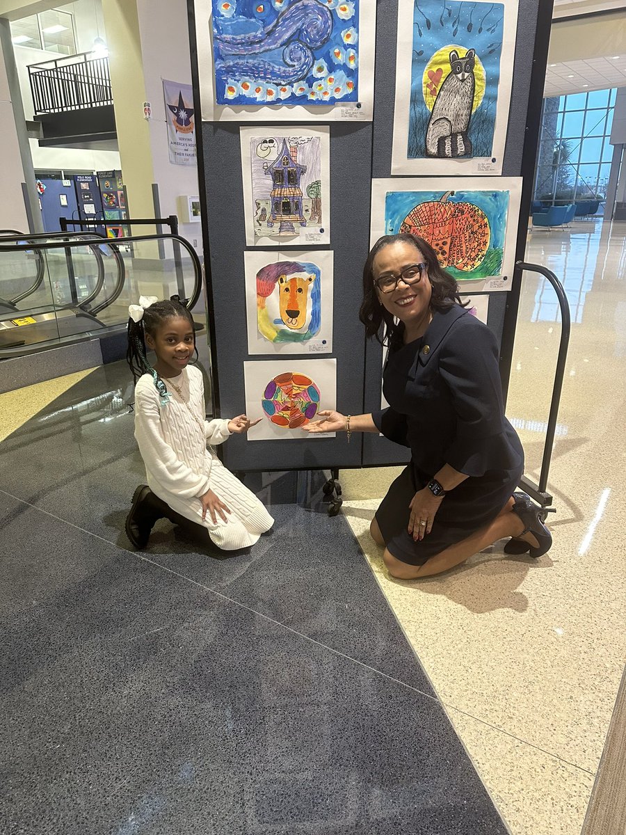 Superintendent <a href="/MooreKimD/">Dr. Kim D. Moore</a> spent time last night at the district art show. Here she is with <a href="/RCE_SAiL/">@RCE_SAiL</a> 3rd grader  Olivia Wilkes and her artwork called “Radial symmetry”.