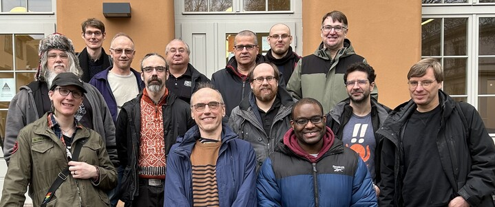 The C Standards Committee outside the eXplora building at the historic site of the old Hôpital Civil where we successfully completed the 69th meeting of WG14.  In addition to other work, we completed C23, TS 18661-4, and TS 18661-5 this week.