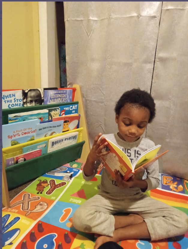 AvenueKae's tweet photo. Kindergartener King diving into a good book in his reading nook #WhitehallReads @WhitehallRAMS https://t.co/rRTBg0MS2r