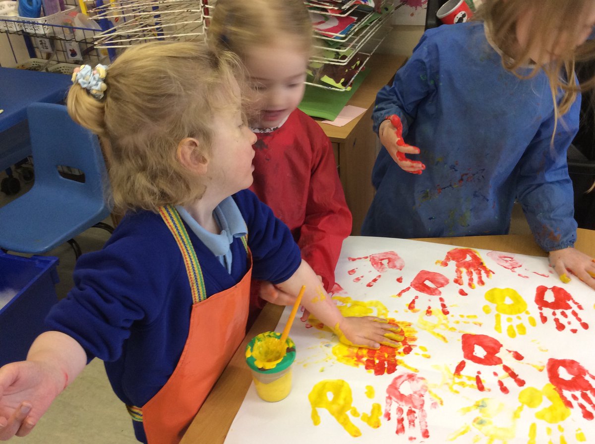 We have been exploring simple print making today.  We used our hands and feet as a printing plate and learned to use the correct pressure to make a print.