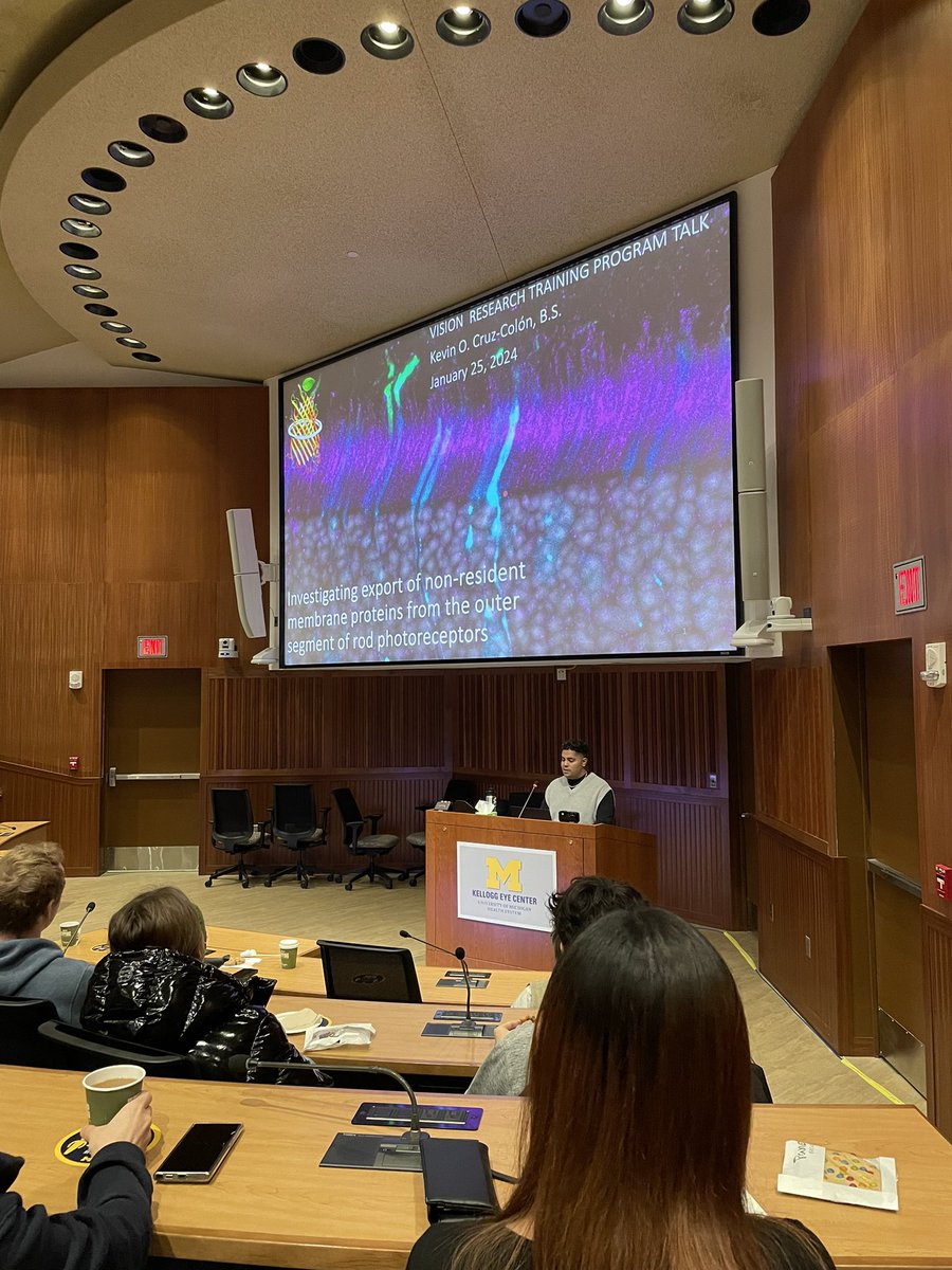 GRozumek's tweet photo. A fellow Vision Research Training Program (#VRTP) trainee @kevincruz26 in action giving a fantastic Vision Research Seminar today on membrane protein transport in photoreceptors 👏🏻 Thanks for showing us how it’s done 🤩 @UMKelloggEye https://t.co/bDzTpBsxa9