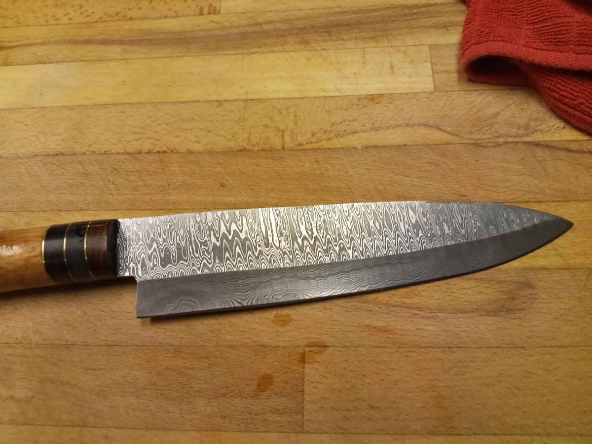 My newkitchen knife
Gifted  by my #3 son, Joshua 
Beautiful hand crafted tool