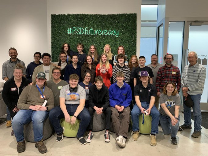 The full group of participating students, teachers, PSDTV staff and industry professional pose for a photo at the Future Ready Center during the inaugural PSD Media Retreat.