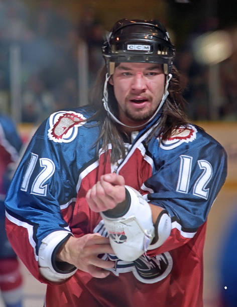 hockey_samurai's tweet photo. When Chris Simon won the Stanley Cup with the Colorado Avalanche in 1996, he took the Stanley Cup to his hometown of Wawa, Ontario and showed off the Cup to the town and then took Stanley out fishing with his grandmother. https://t.co/gfo7vLv1PA