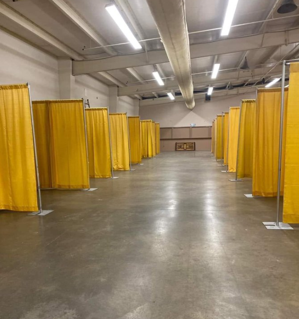 CreeksideAlison's tweet photo. $3M emergency homeless shelter at the forum in Halifax - made of curtain dividers used for for display booths (h/t @Girrl_Friday)
vs 
emergency homeless shelter in Finland - a bed, a fridge, a desk, a window and a door that locks.  #homelessness #cdnpoli https://t.co/DhNNXKfR5Y