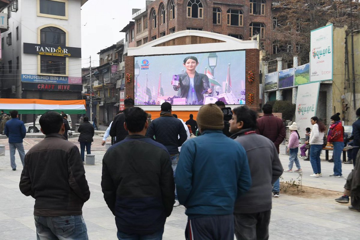 People witness the live Republic Day celebrations being held in New Delhi on big screens at Lal Chowk, Srinagar. © Basit Zargar