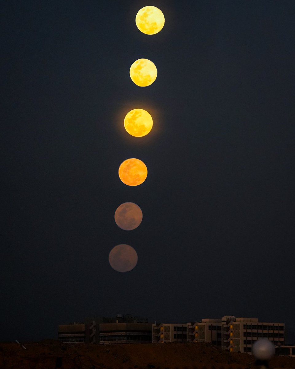 A composite image of the Wolf Moon is rising over Colombo, Sri Lanka, on January 25, 2024.