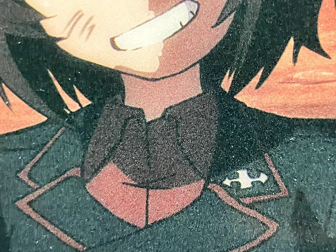 最近の版権絵では合わせ目が右寄りに描かれることもあるから普通に比翼ボタンかなあ