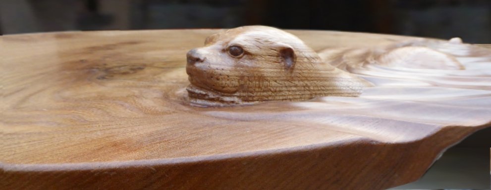 CallumGRobinson's tweet photo. My father's carving chisels are still virtually smoking from  this beautiful new intimately-scaled Otter Table.
Solid Scottish elm.
David Robinson, 2024
(More images to follow) 
#otterman #otters #ottercarving #woodcarving #carving #mastercarver https://t.co/eDtZIuVVQq