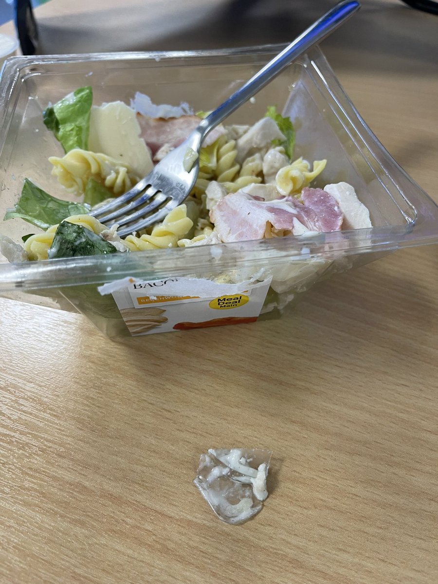 KOGaroo's tweet photo. @Tesco just cut my mouth on hard plastic found in your chicken and bacon salad! Looks like packaging or possibly part of an ID badge holder. This is one bit, so where’s the rest? You may want to consider a product recall. https://t.co/TDpIeY4vqt