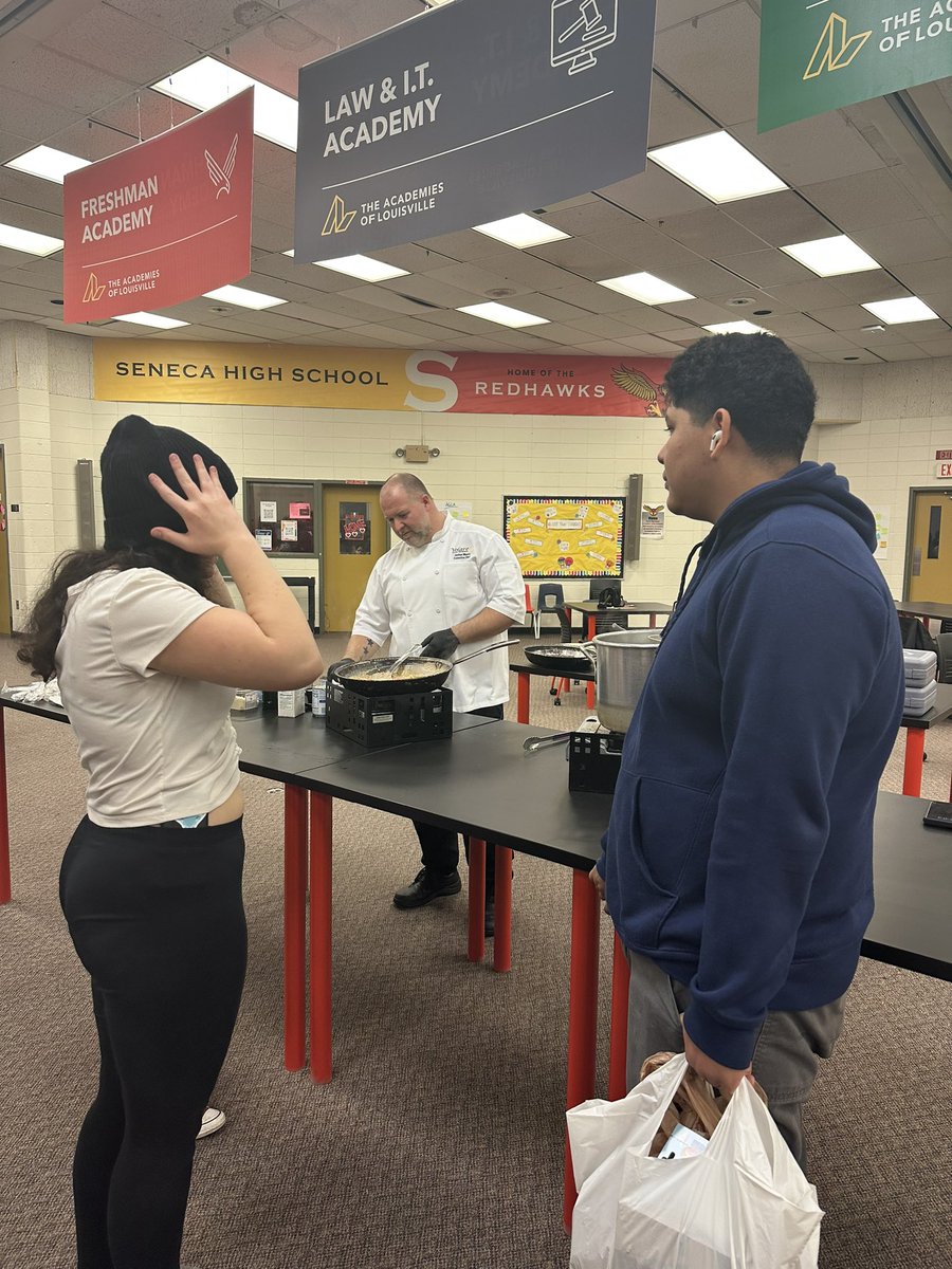 JudyKySelect's tweet photo. Chef Josh Moore of Volare does a cooking demonstration at Seneca HS. Students @CarolesKitchen Pantry took the recipe and ingredients home ❤️#feedingthesoul https://t.co/h7MIs9DUIl